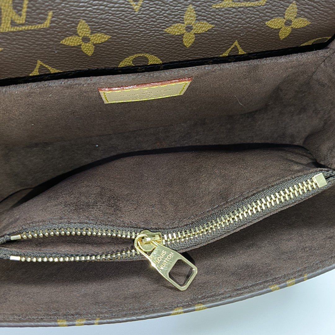 MÉTIS EAST WEST Monogram Coated Canvas Brown
