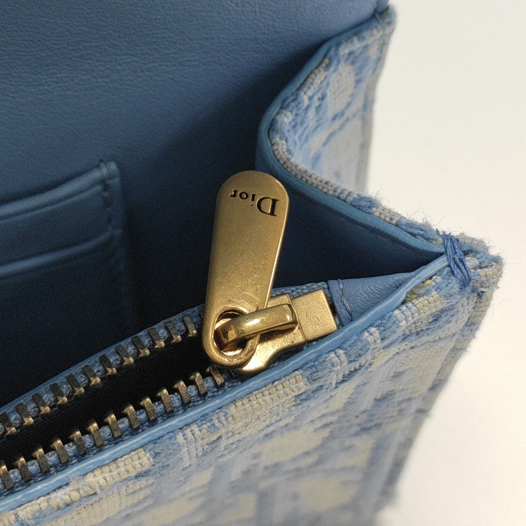 Authenticated pre-owned  Saddle Oblique Canvas Blue - Shoulder Bag at Looply