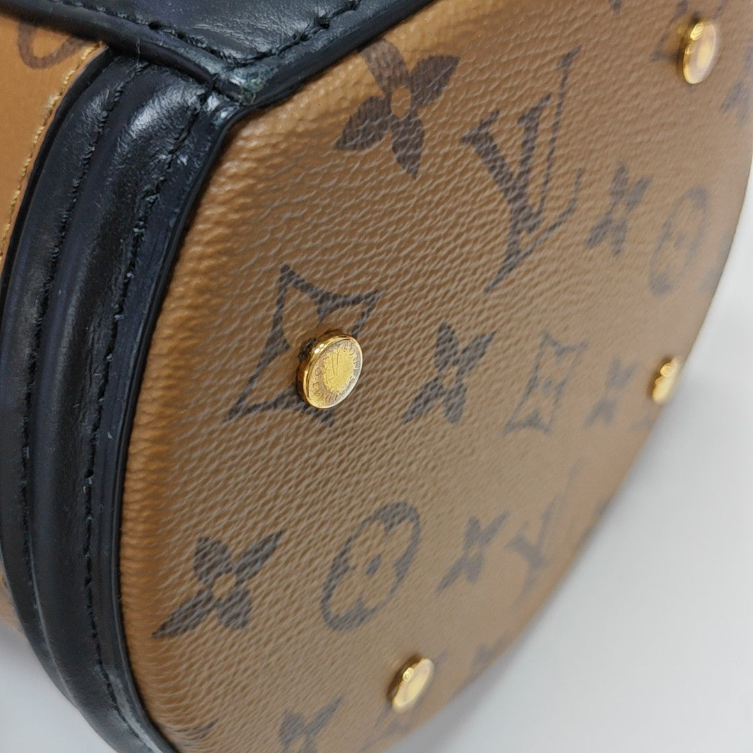 CANNES PM Monogram Coated Canvas Brown