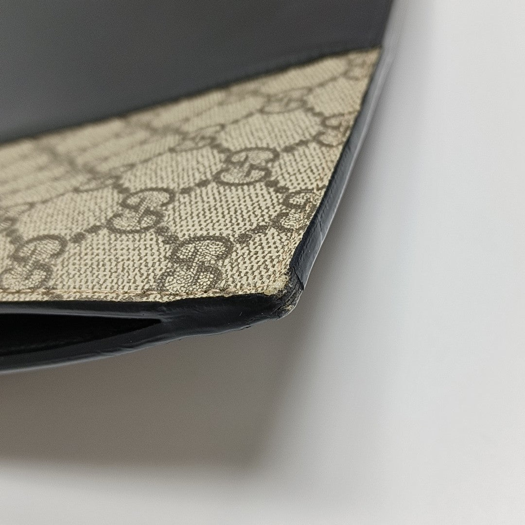 GG Supreme Monogram Coated Canvas Brown