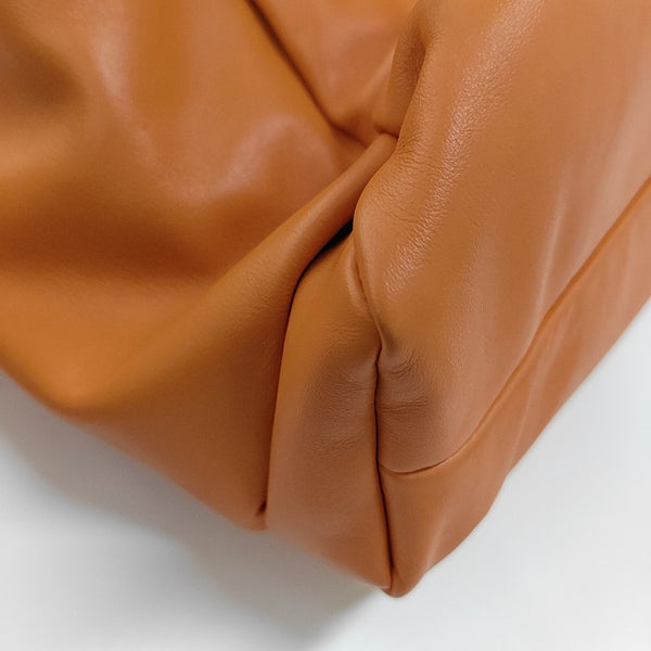 Authenticated pre-owned  The Pouch Calfskin Orange - Top Handle Bag at Looply