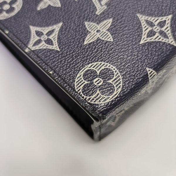 Pochette Voyag MM Monogram Coated Canvas Blue