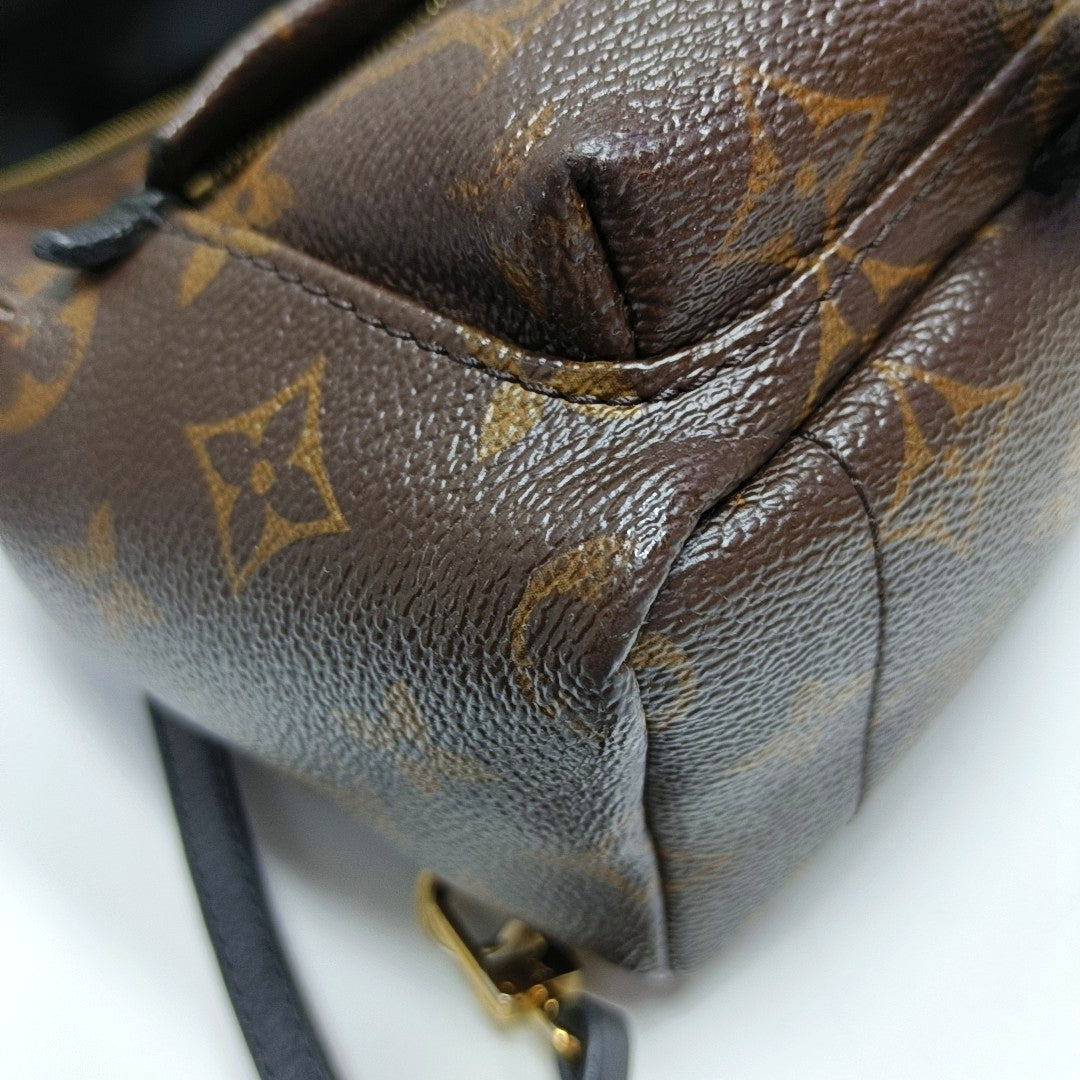 Authenticated pre-owned  PALM SPRINGS Mini Monogram Coated Canvas Brown - Backpack at Looply