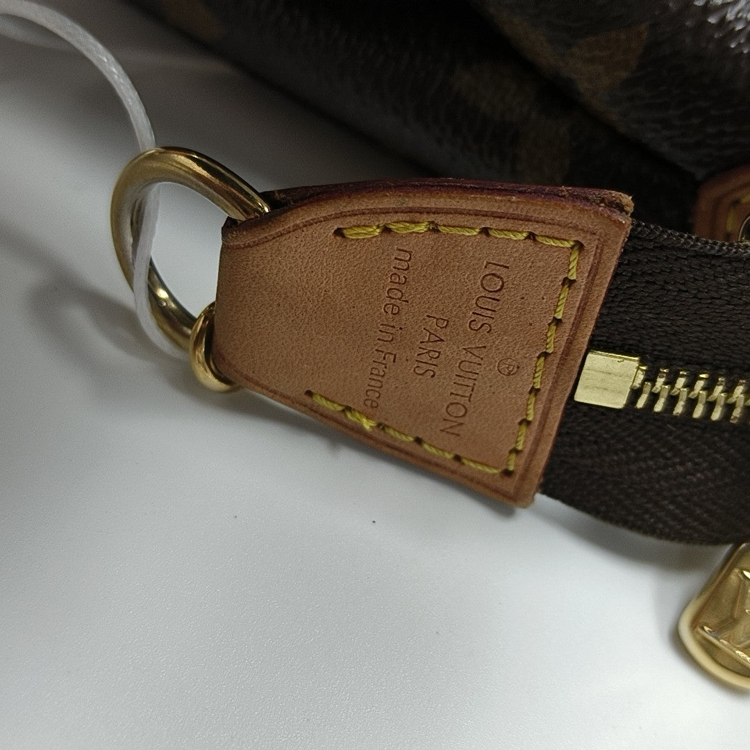 EVA Monogram Coated Canvas Brown