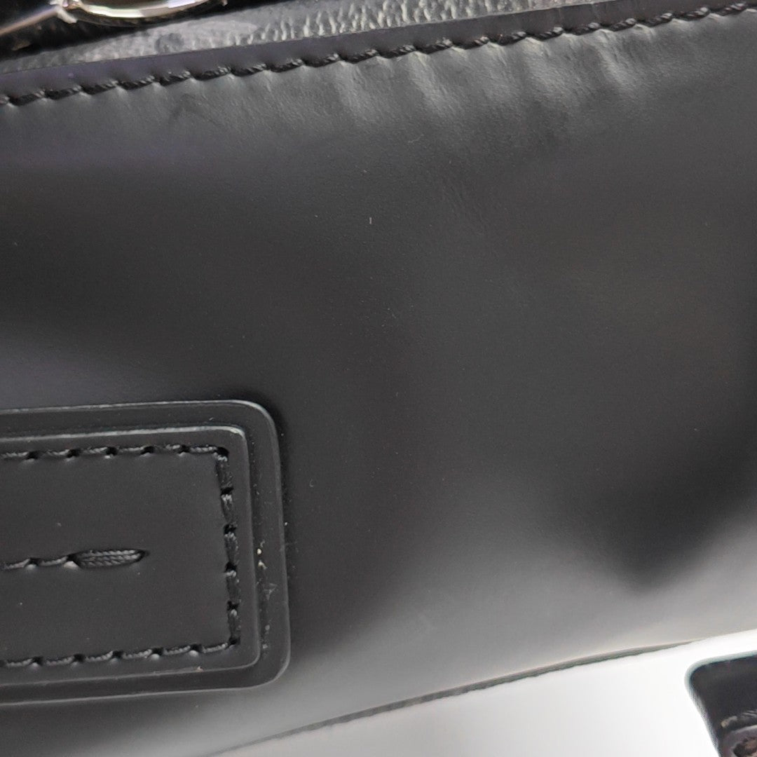 VOYAGER PM Monogram Coated Canvas Black
