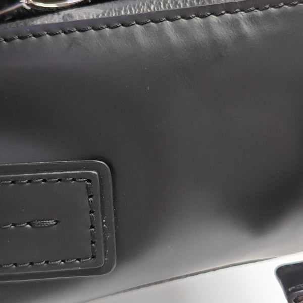 VOYAGER PM Monogram Coated Canvas Black
