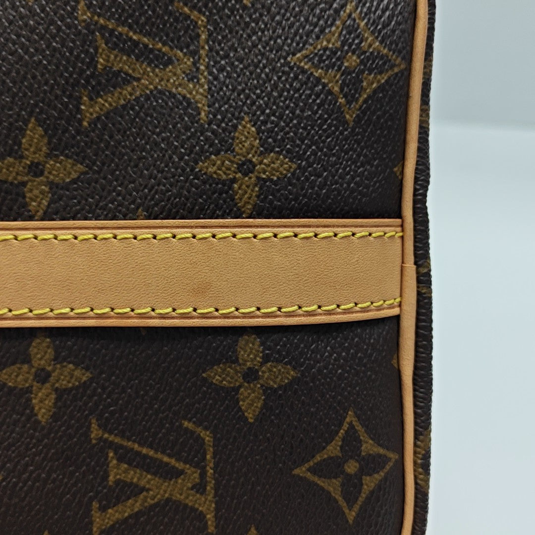 SPEEDY 25 Monogram Coated Canvas Brown