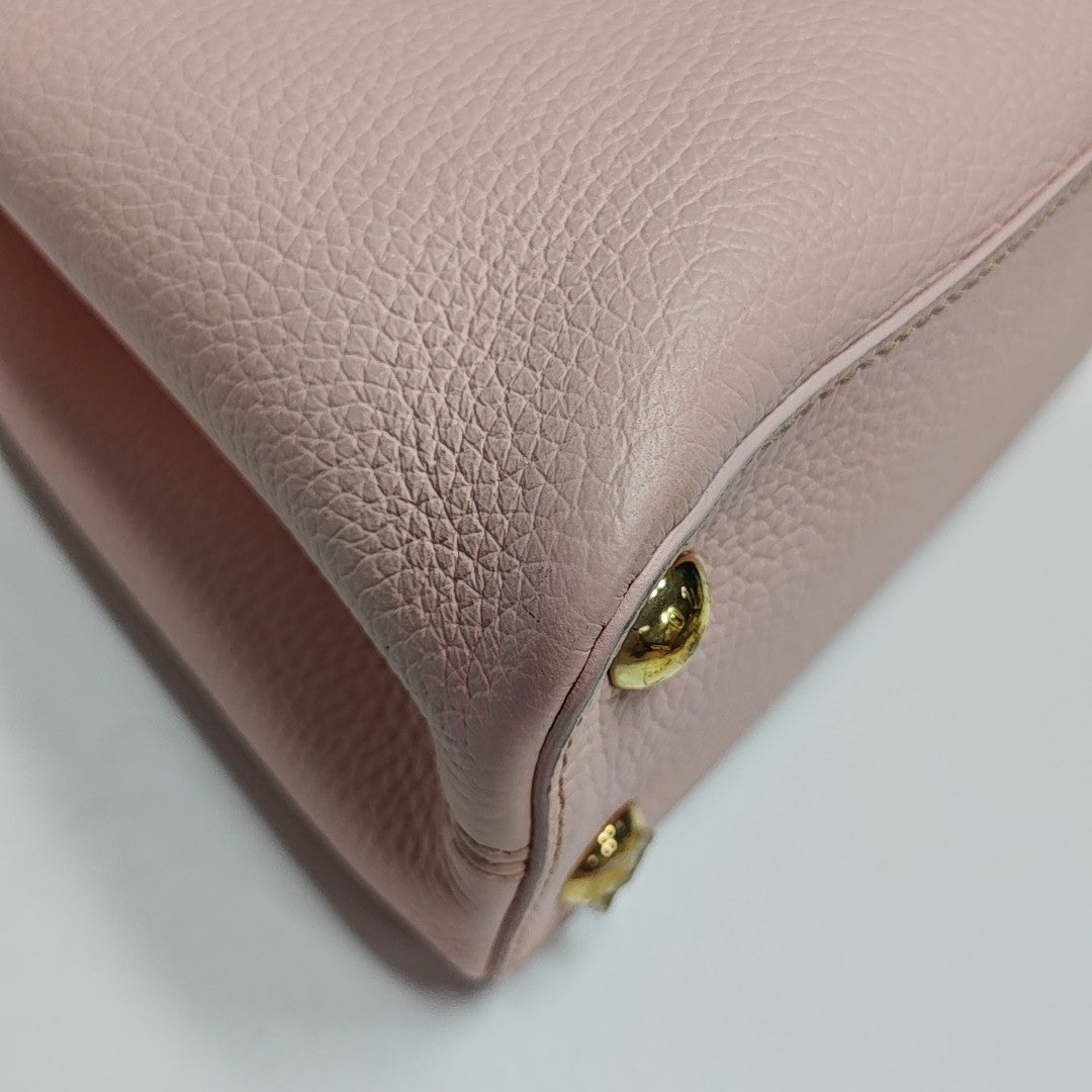 Authenticated pre-owned  CAPUCINES PM Calfskin Pink - Shoulder Bag at Looply