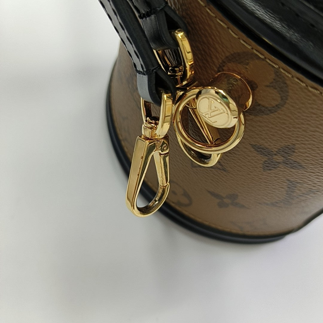 CANNES PM Monogram Coated Canvas Brown