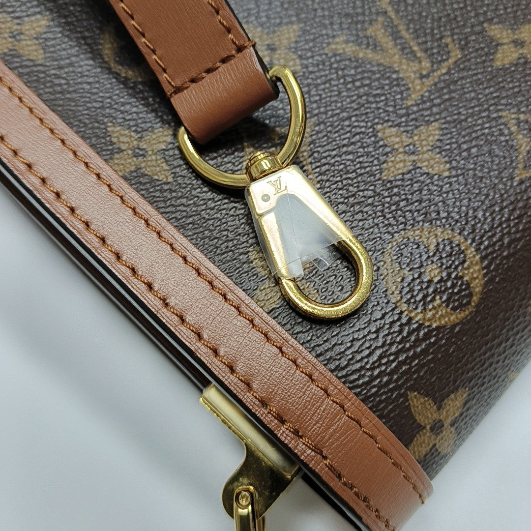 DAUPHINE MM Monogram Coated Canvas Brown