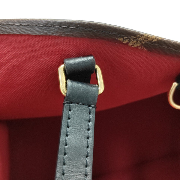 ONTHEGO MM Monogram Coated Canvas Brown