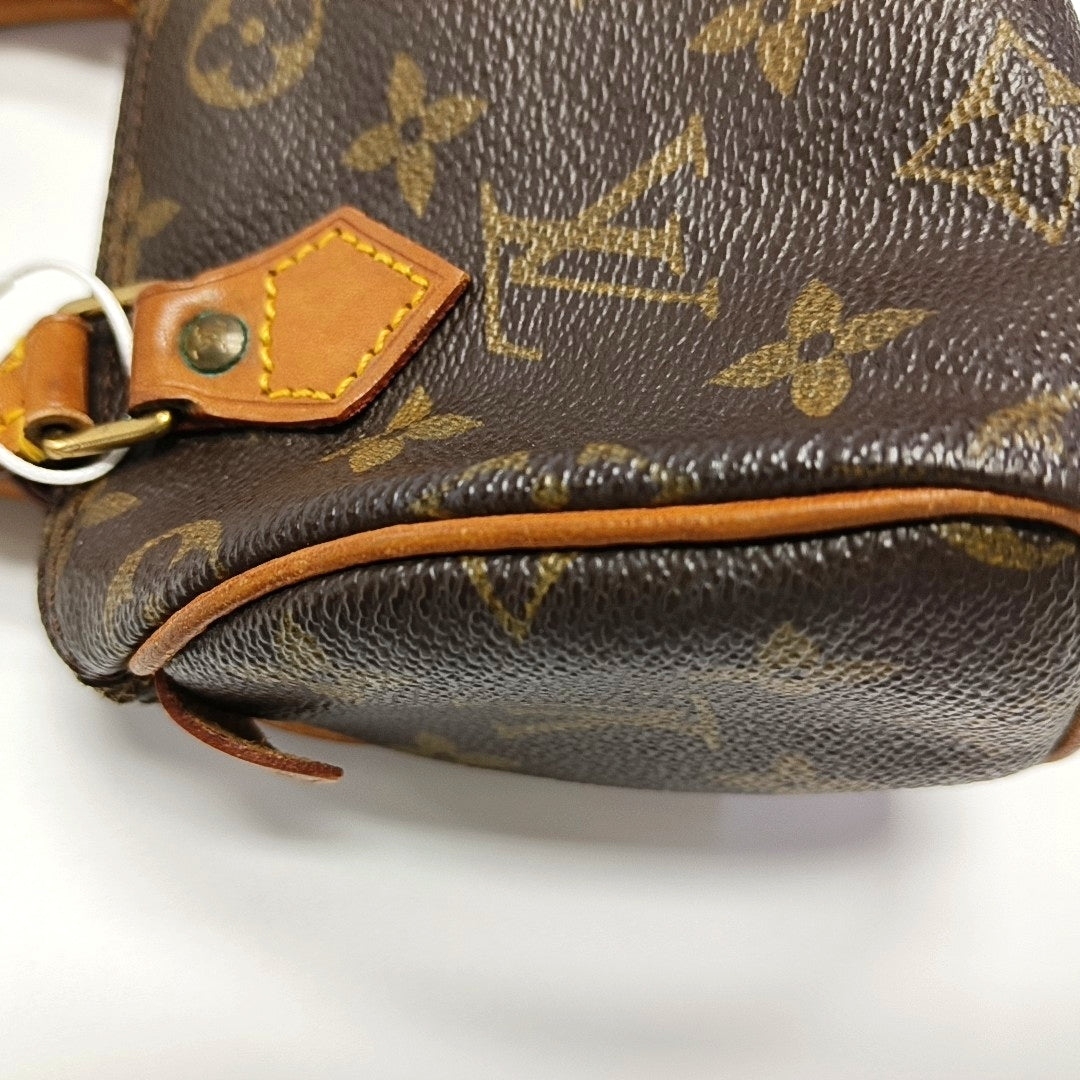 Authenticated pre-owned  SPEEDY Nano Monogram Coated Canvas Brown - Top Handle Bag at Looply