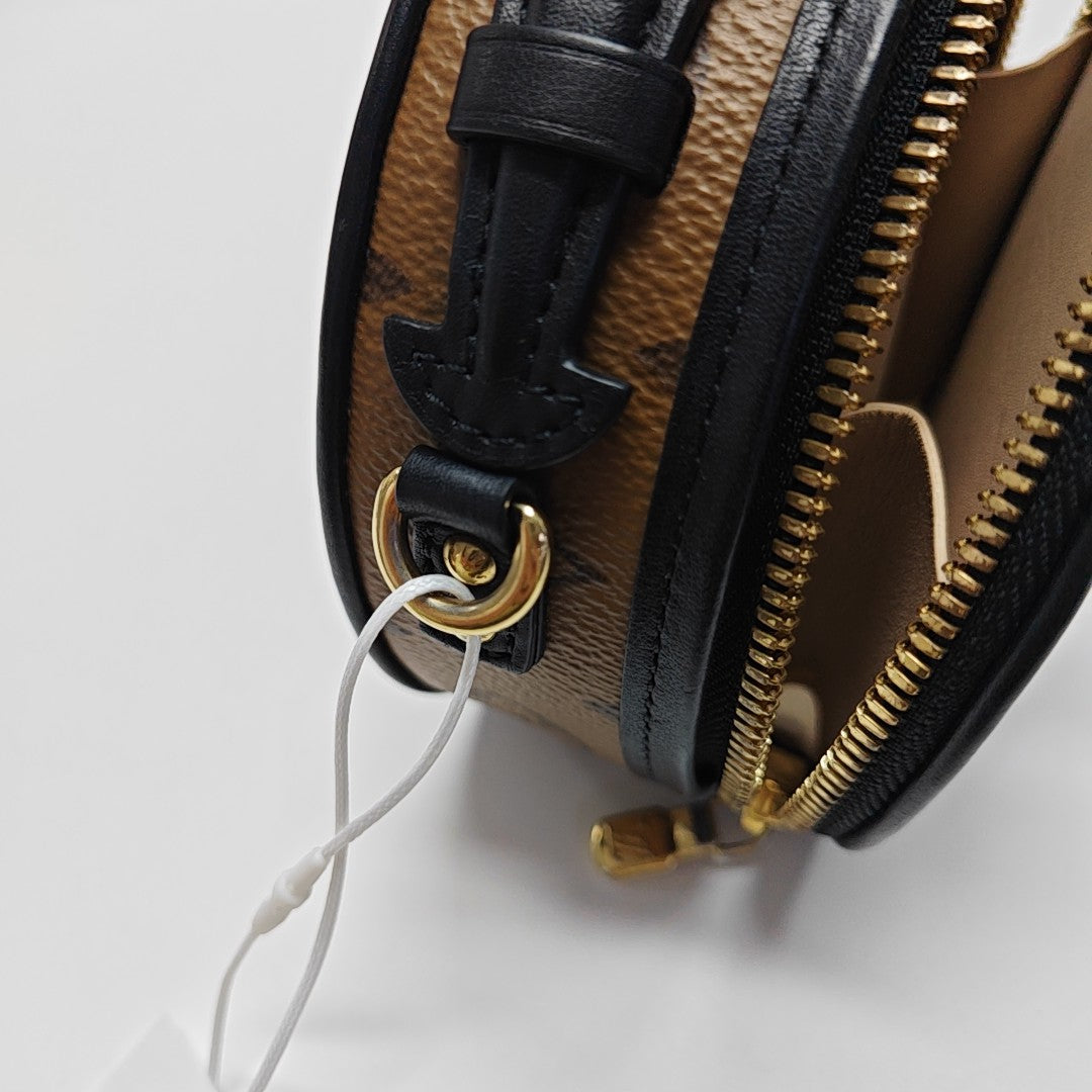 BOITE CHAPEAU Mini Monogram Coated Canvas Brown