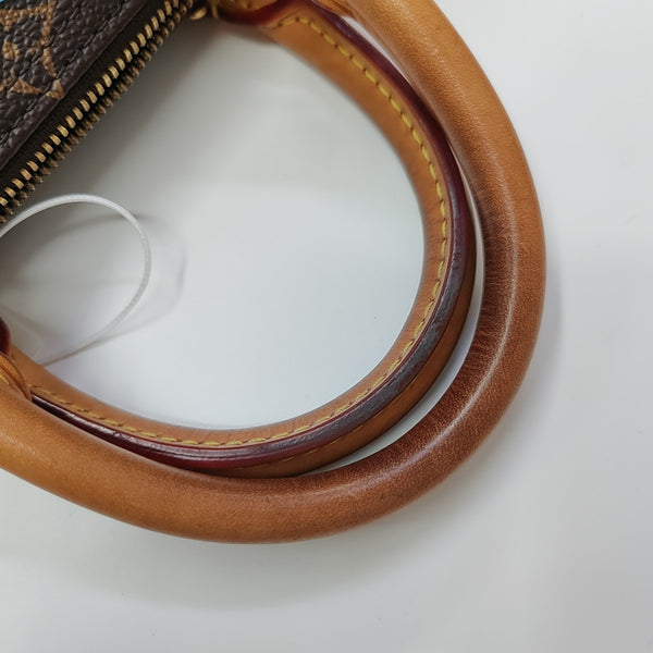SPEEDY 25 Monogram Coated Canvas Brown