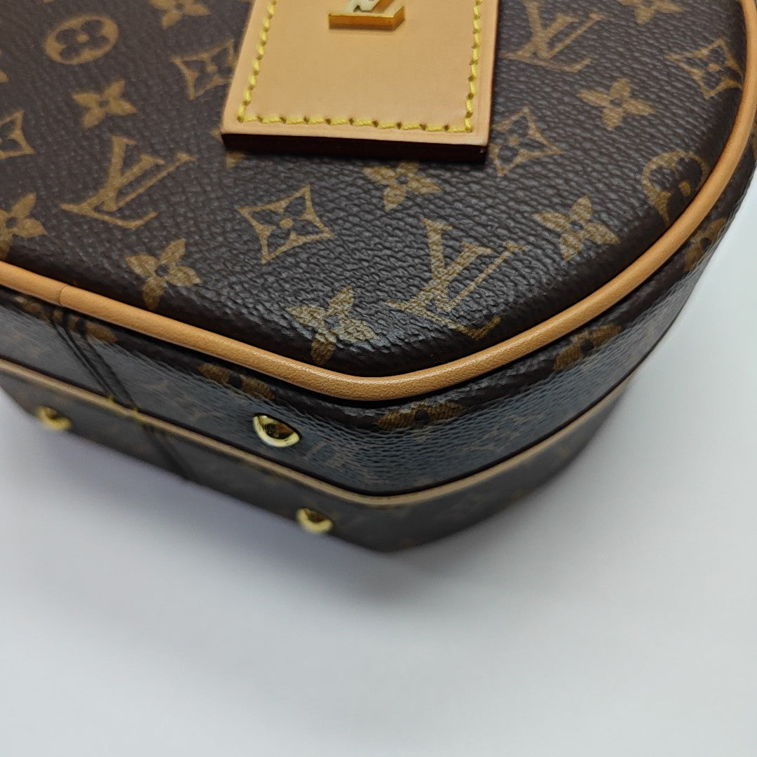 BOITE CHAPEAU PM Monogram Coated Canvas Brown