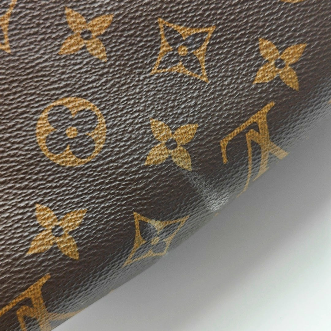 Authenticated pre-owned  SPEEDY 25 Monogram Coated Canvas Brown - Top Handle Bag at Looply