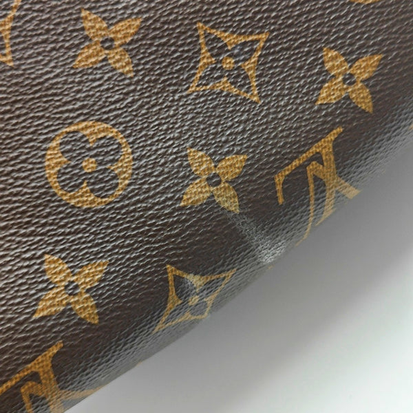 Authenticated pre-owned  SPEEDY 25 Monogram Coated Canvas Brown - Top Handle Bag at Looply