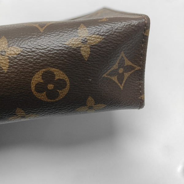 TOILET POCKET 19 Monogram Coated Canvas Brown