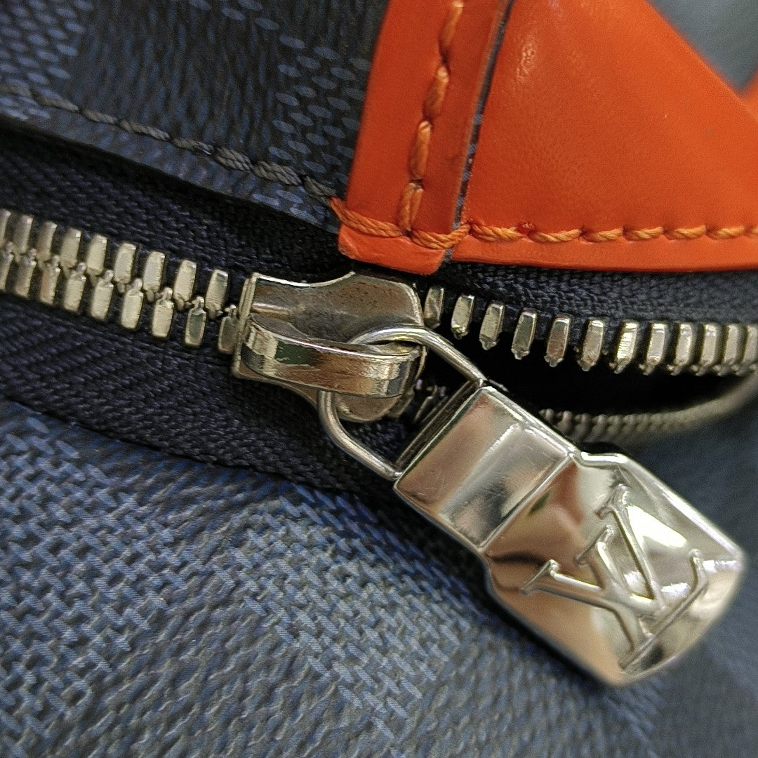 DISCOVERY Damier Coated Canvas Blue