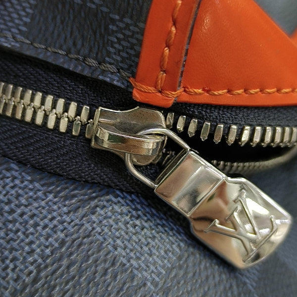 DISCOVERY Damier Coated Canvas Blue