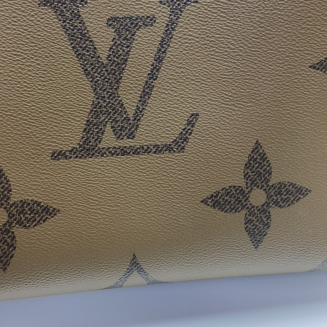 ONTHEGO MM Monogram Coated Canvas Brown