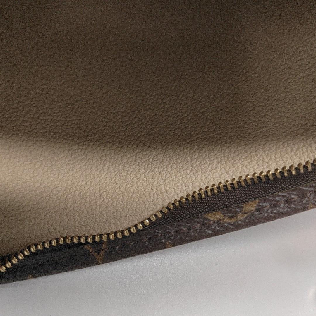 TOILET POCKET 26 Monogram Coated Canvas Brown