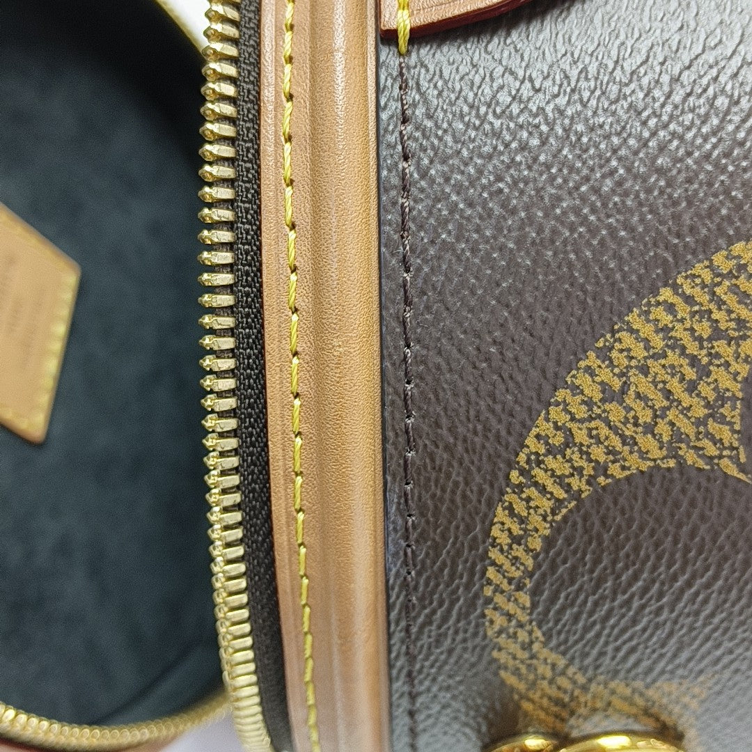 CANNES Monogram Coated Canvas Brown