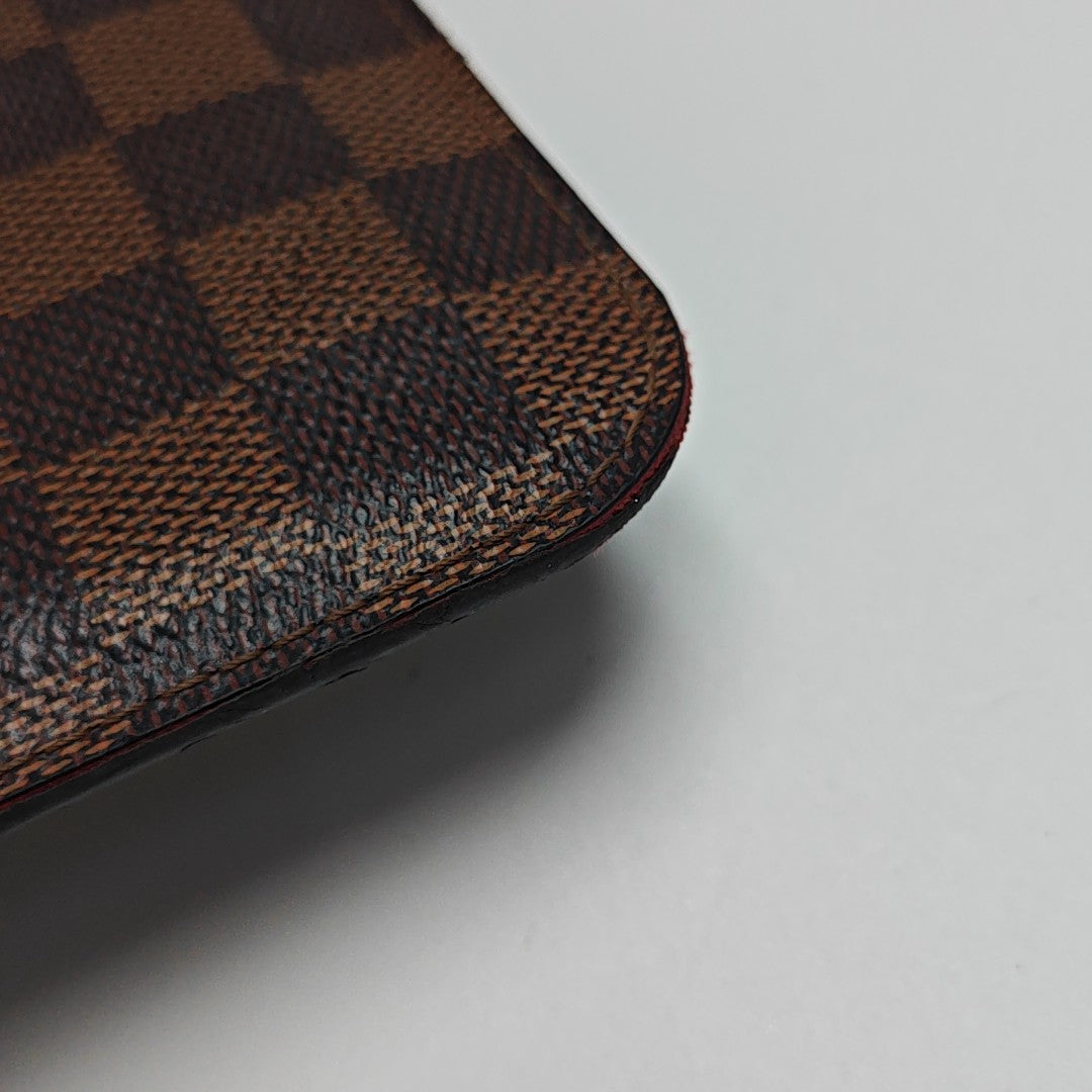 Damier Ebene Coated Canvas Clutch Brown