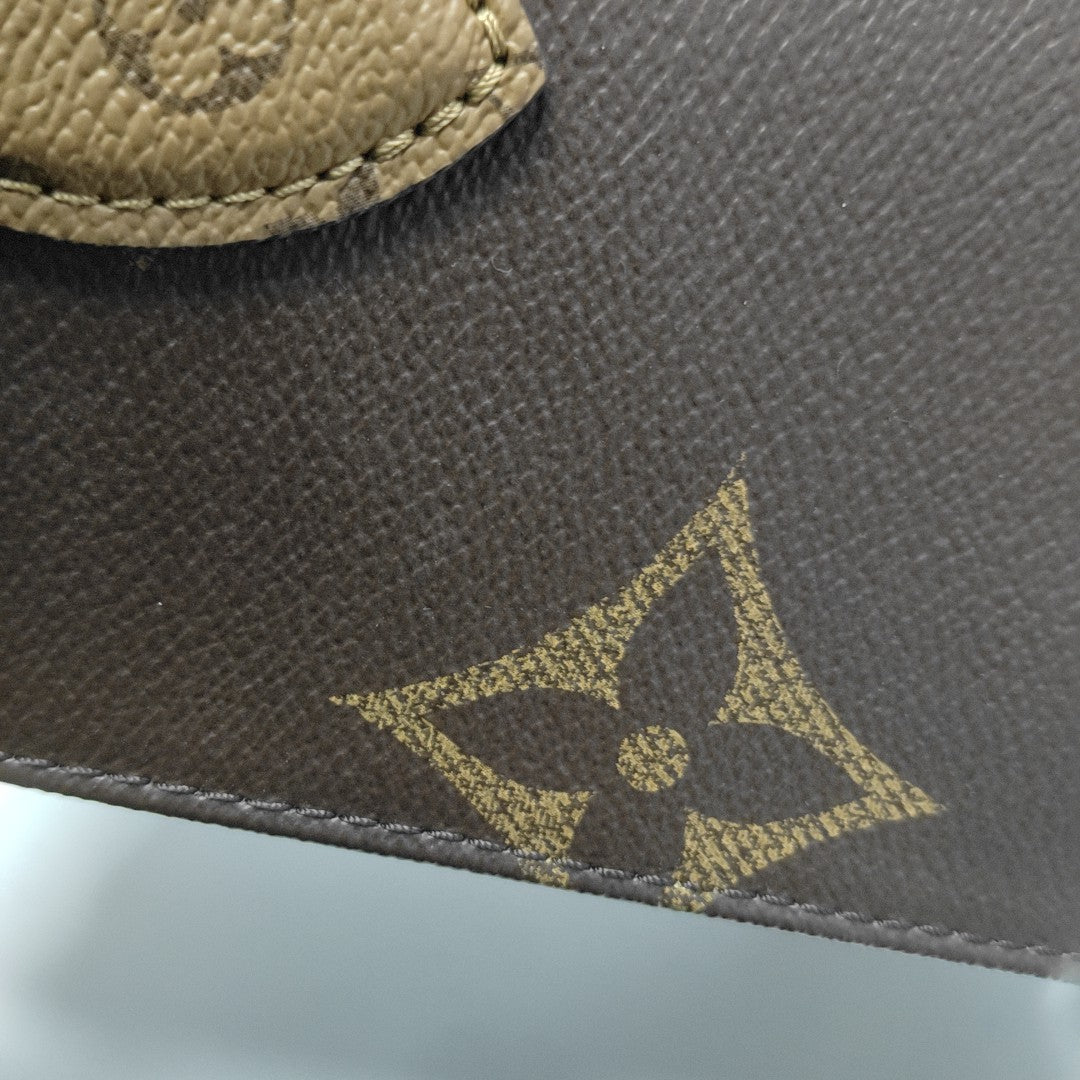 ONTHEGO PM Monogram Coated Canvas Brown