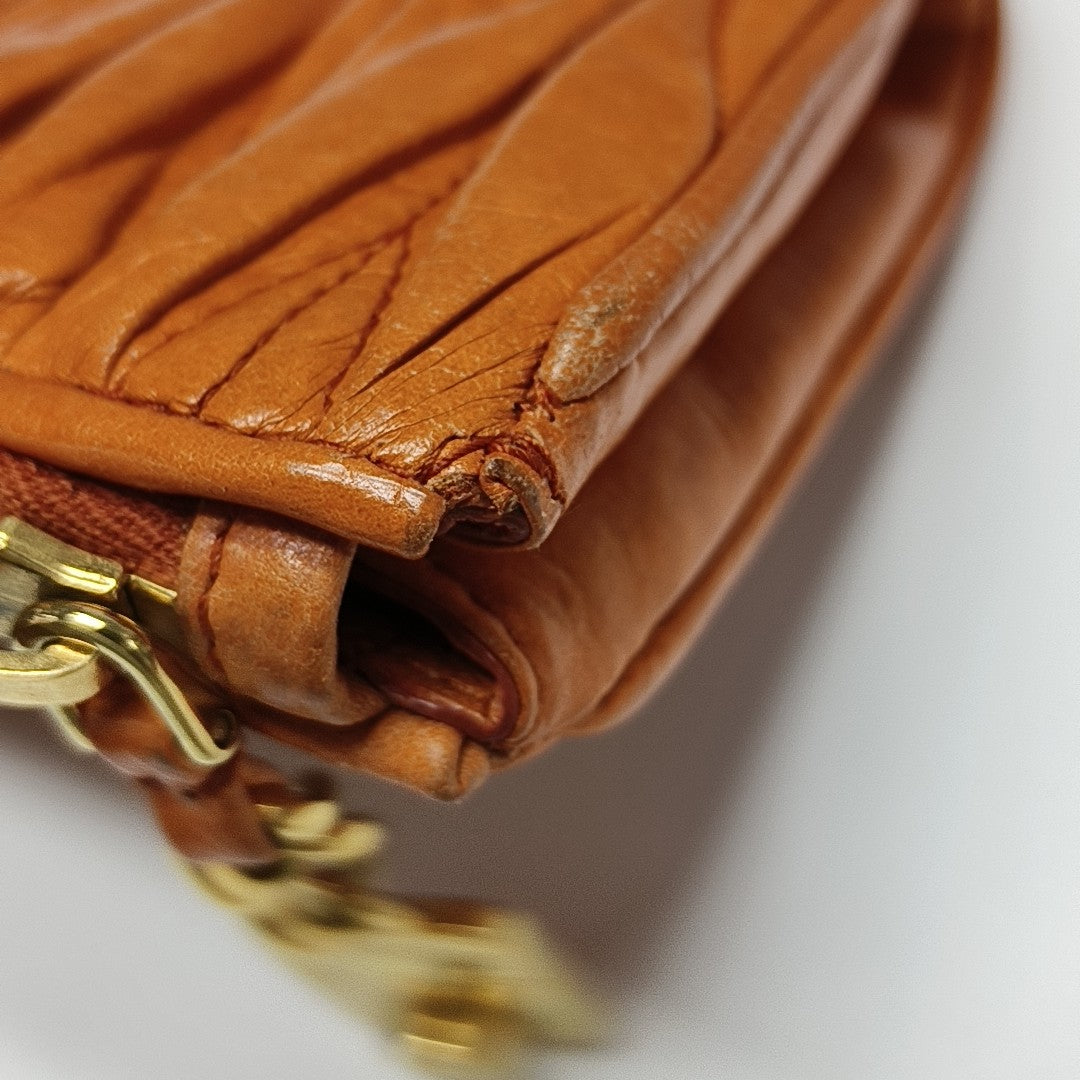 Quilted Lambskin Clutch Orange
