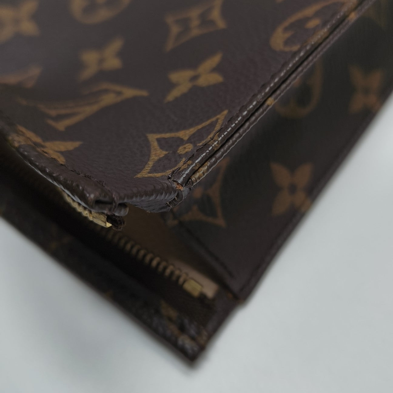 TOILET POCKET 26 Monogram Coated Canvas Brown