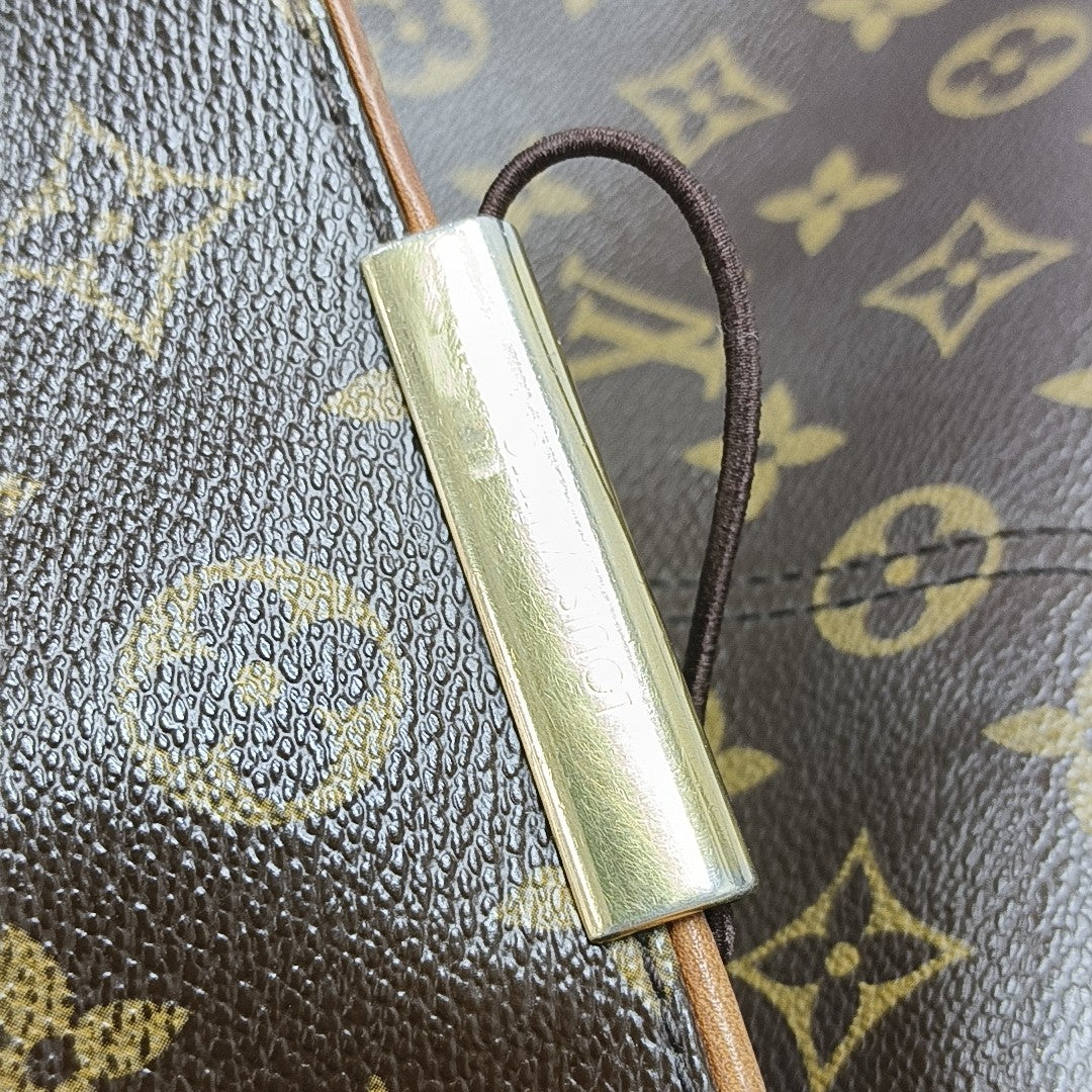VALMY Monogram Coated Canvas Brown