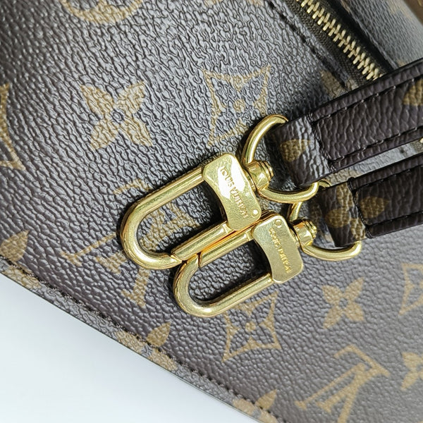 MÉTIS EAST WEST Monogram Coated Canvas Brown