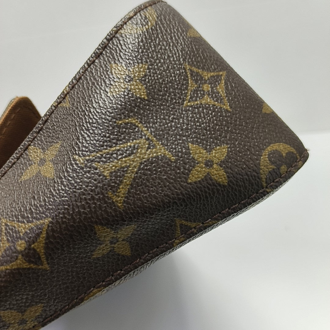 LOOPING PM Monogram Coated Canvas Brown