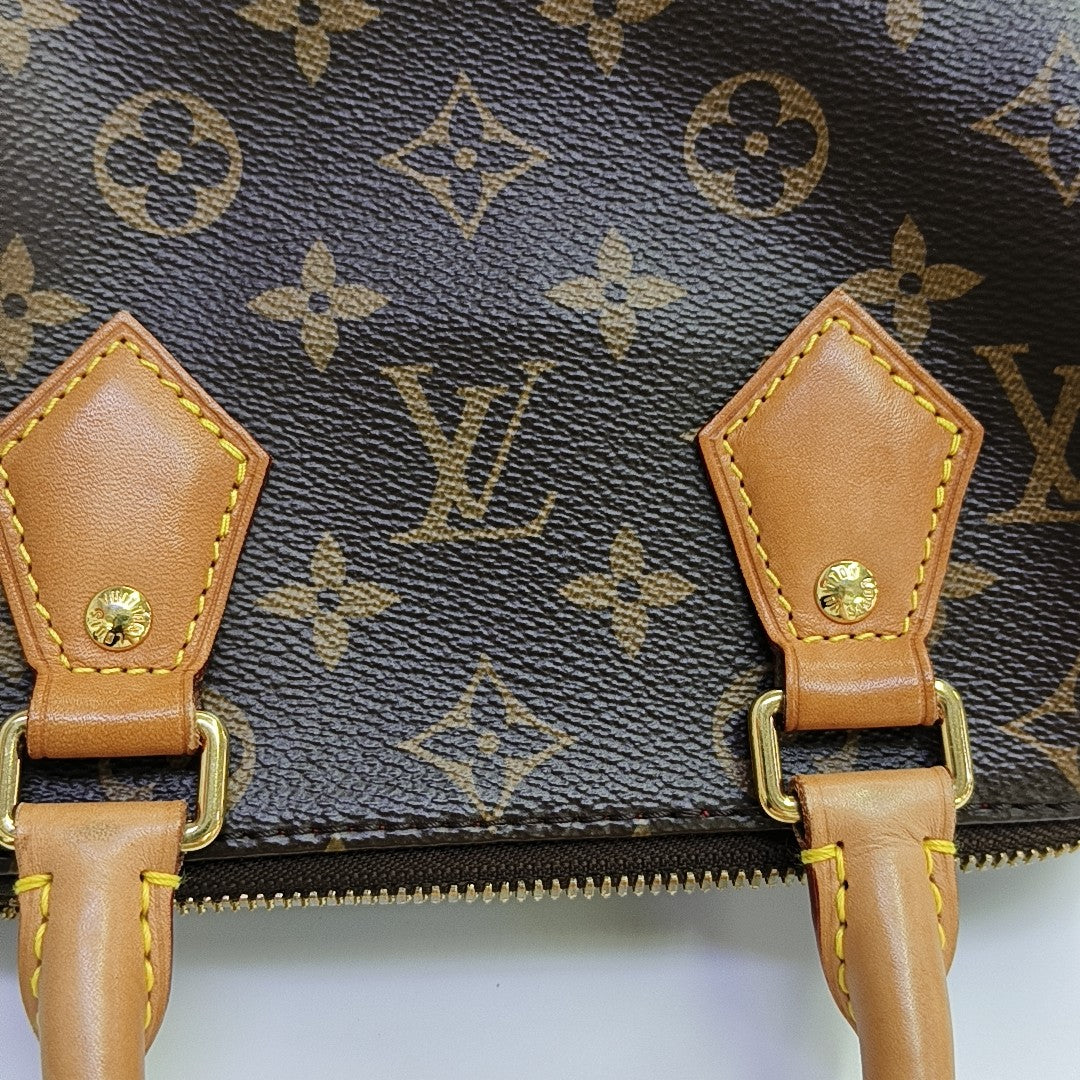 SPEEDY 20 Monogram Coated Canvas Brown