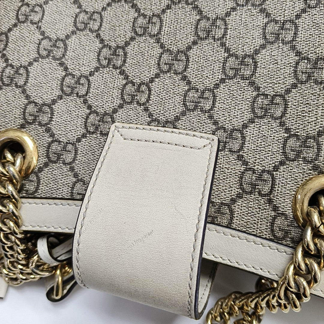 Padlock Small Monogram Coated Canvas Beige