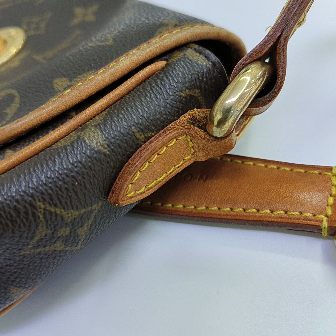 TIKAL Monogram Coated Canvas Brown
