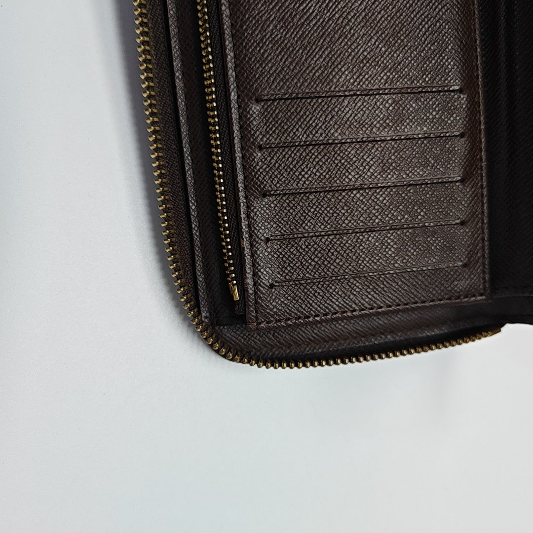 ZIPPY Damier Ebene Coated Canvas Brown Wallet