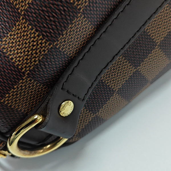 SPEEDY 25 Damier Ebene Coated Canvas Brown