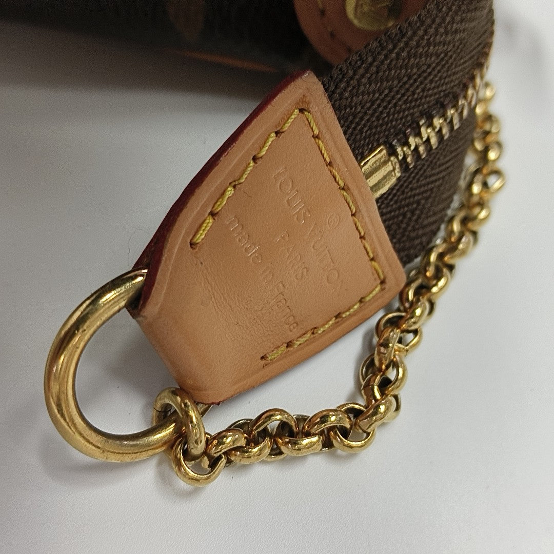 EVA Monogram Coated Canvas Brown