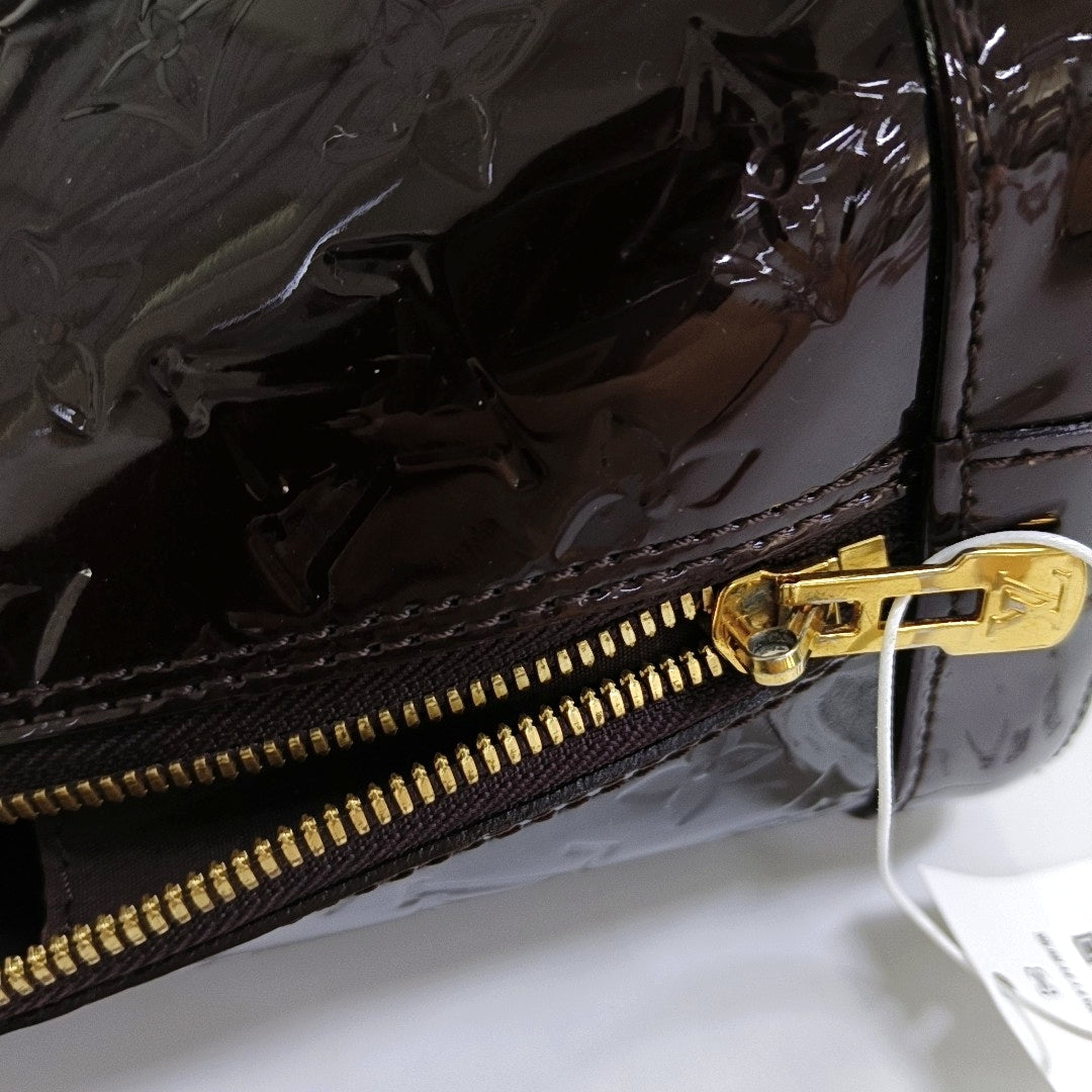 Authenticated pre-owned  ALMA PM Monogram Patent Leather Burgundy - Top Handle Bag at Looply