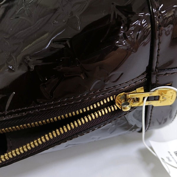Authenticated pre-owned  ALMA PM Monogram Patent Leather Burgundy - Top Handle Bag at Looply