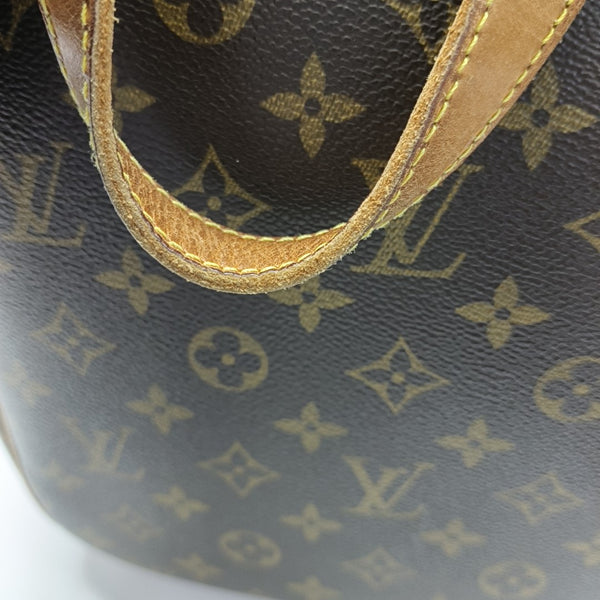 EXCURSION Monogram Coated Canvas Brown