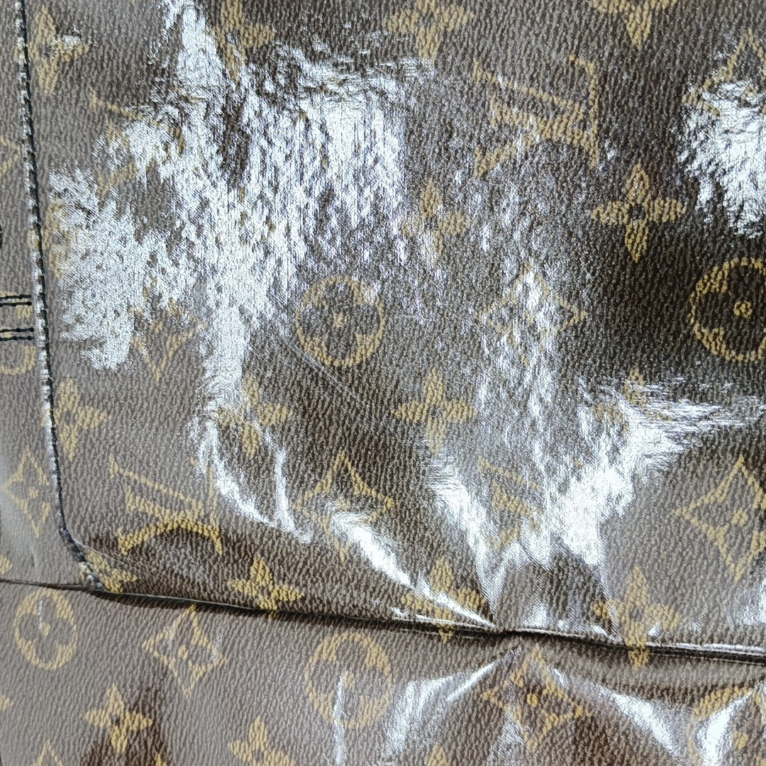 EXPLORER Monogram Coated Canvas Brown