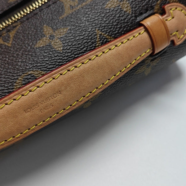 MÉTIS EAST WEST Monogram Coated Canvas Brown