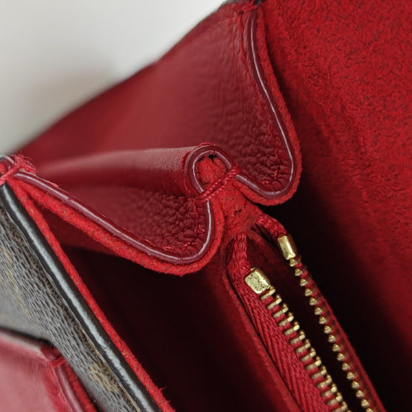 VICTOIRE Monogram Coated Canvas Brown