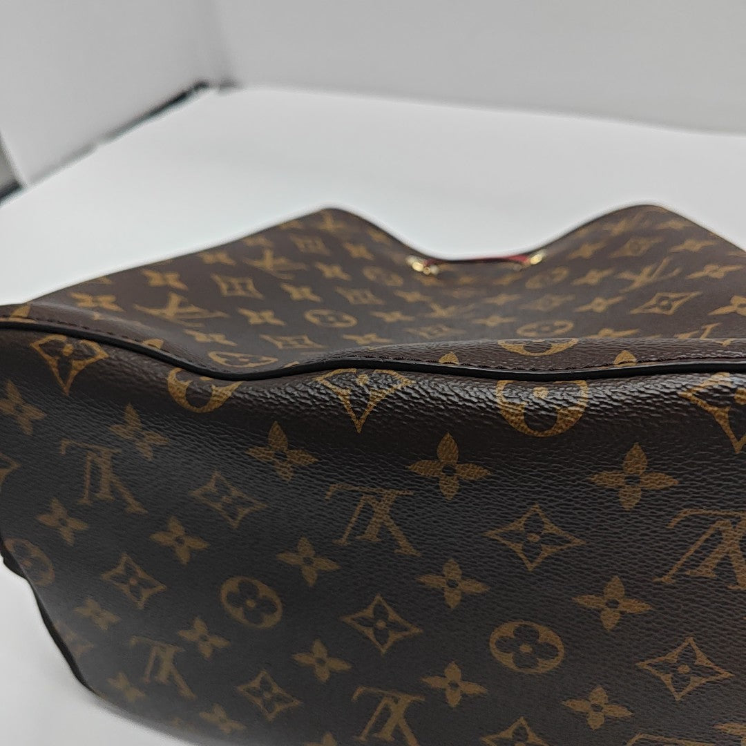 NÉONOÉ MM Monogram Coated Canvas Brown