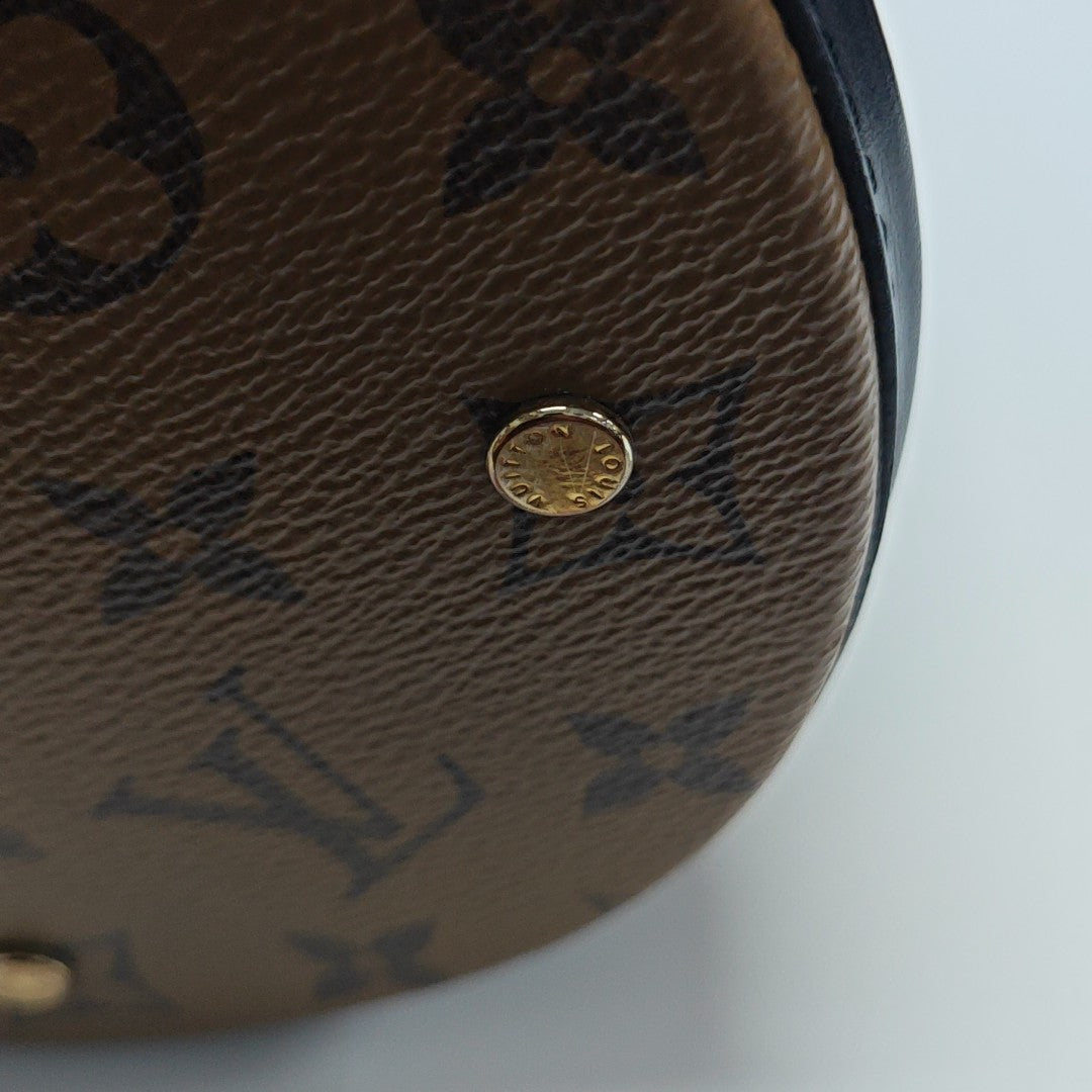 CANNES PM Monogram Coated Canvas Brown