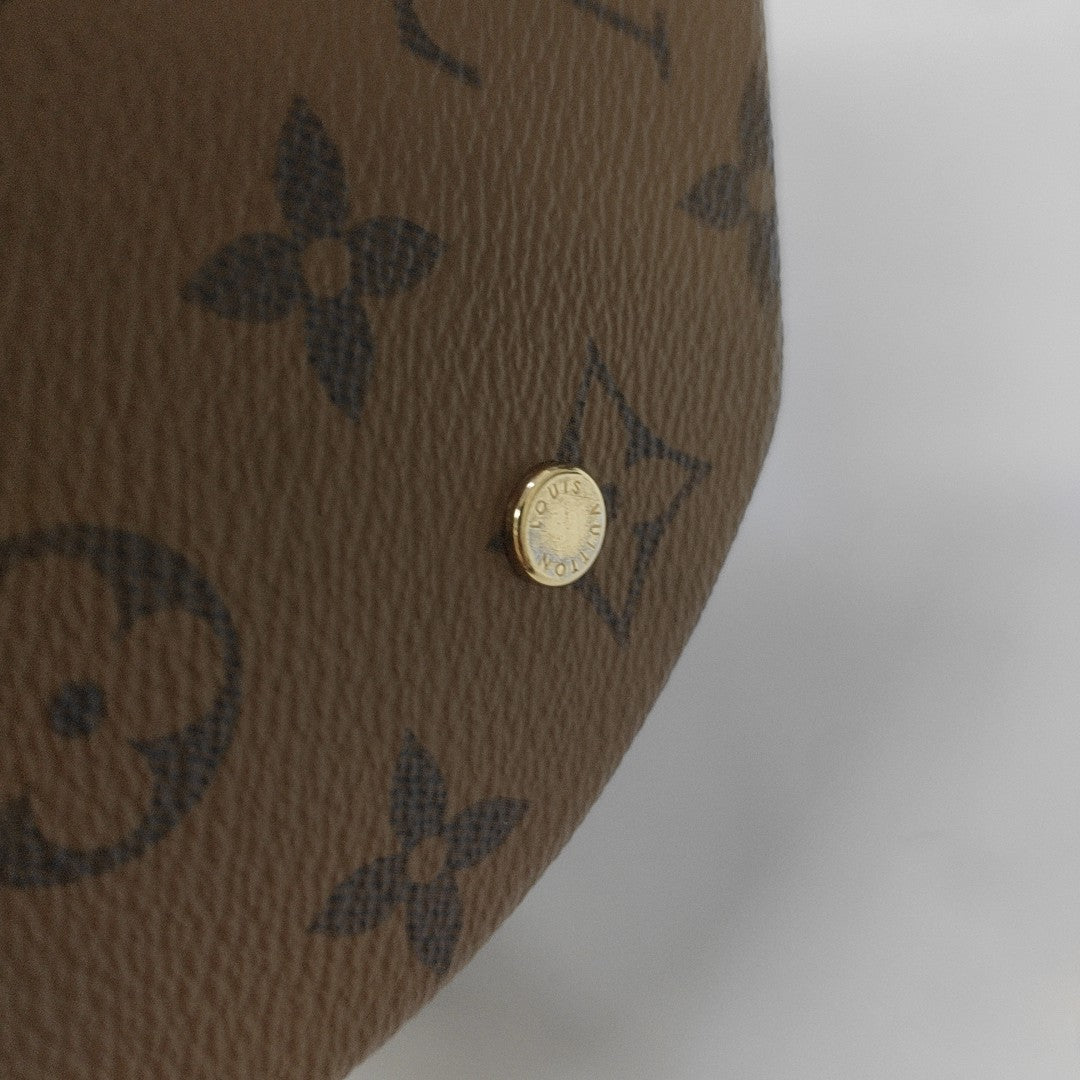 CANNES PM Monogram Coated Canvas Brown