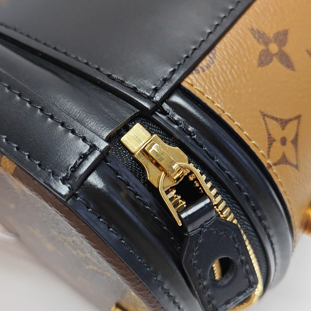 CANNES PM Monogram Coated Canvas Brown